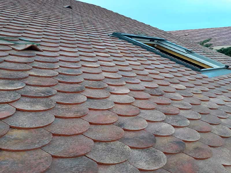 toiture en tuiles plates à écailles à nanterre par alexis couverture